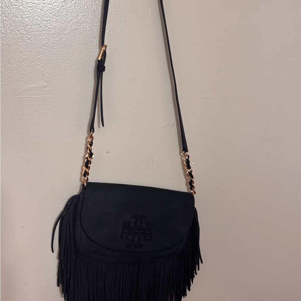 “Tory Burch Fleming Suede Fringe Crossbody Bag – Navy Blue”

• - Picture 7 of 10